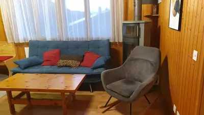 Ein Sitzbereich in der Unterkunft Chalet Falk