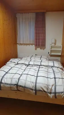 Ein Bett oder Betten in einem Zimmer der Unterkunft Chalet Falk