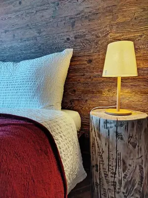 Ein Bett oder Betten in einem Zimmer der Unterkunft Sonnenhof - Wengens Original Kurhaus