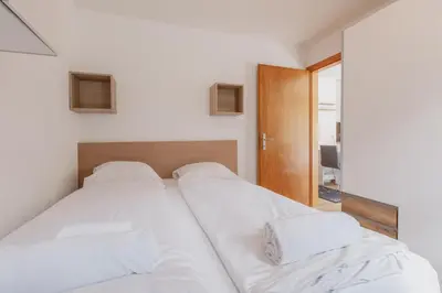 Ein Bett oder Betten in einem Zimmer der Unterkunft Appartement ski in&out à Thyon