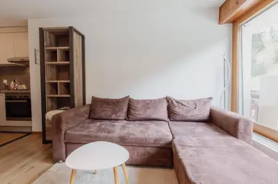 Ein Sitzbereich in der Unterkunft Appartement ski in&out à Thyon