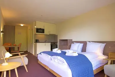 Ein Bett oder Betten in einem Zimmer der Unterkunft Eiger Studio