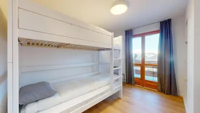 Ein Bett oder Betten in einem Zimmer der Unterkunft Chalet de l Ours
