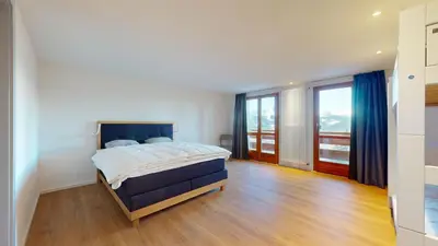 Ein Bett oder Betten in einem Zimmer der Unterkunft Chalet de l Ours