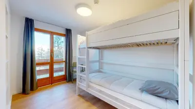 Ein Bett oder Betten in einem Zimmer der Unterkunft Chalet de l Ours AUTHENTIC Etage Fontaine 14 pers