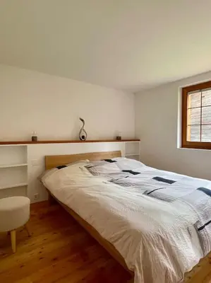 Ein Bett oder Betten in einem Zimmer der Unterkunft Appartement spacieux
