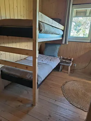 Ein Bett oder Betten in einem Zimmer der Unterkunft Ô Bercail