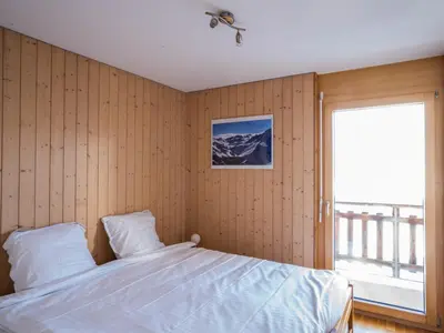 Ein Bett oder Betten in einem Zimmer der Unterkunft Apartment Les Cîmes 4 by Interhome