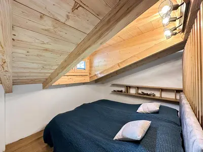 Ein Bett oder Betten in einem Zimmer der Unterkunft Dynastic Penthouse - 4 Valleys - Swiss Alps