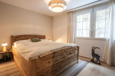 Ein Bett oder Betten in einem Zimmer der Unterkunft Aquila Apartment by Homeflow