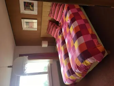 Ein Bett oder Betten in einem Zimmer der Unterkunft Apartment Shalom by Interhome