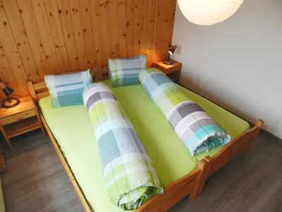 Ein Bett oder Betten in einem Zimmer der Unterkunft Apartment Résidence Sonnegg - Vuilleumier by Interhome
