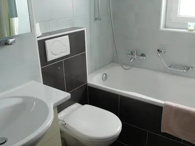 Ein Badezimmer in der Unterkunft Apartment Amici-4 by Interhome