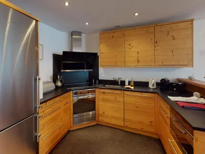Küche/Küchenzeile in der Unterkunft Apartment Haus Whymper Edward Suite by Interhome