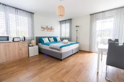 Ein Bett oder Betten in einem Zimmer der Unterkunft Terrace Apartment Einigen