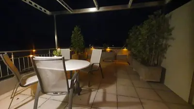 Ein Sitzbereich in der Unterkunft Terrace Apartment Einigen