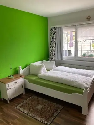 Ein Bett oder Betten in einem Zimmer der Unterkunft Duplex Ferienwohnung Edelweiss