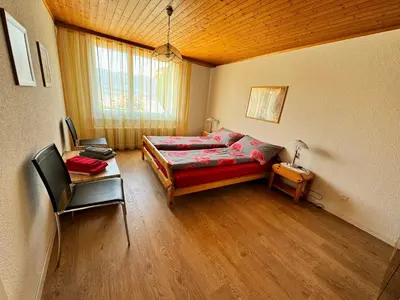 Ein Bett oder Betten in einem Zimmer der Unterkunft Rosenhaus Baccara