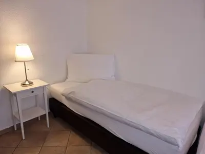 Ein Bett oder Betten in einem Zimmer der Unterkunft Apartment Haus Attila