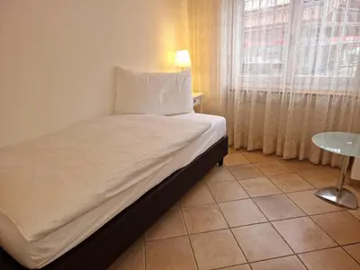 Ein Bett oder Betten in einem Zimmer der Unterkunft Apartment Haus Attila