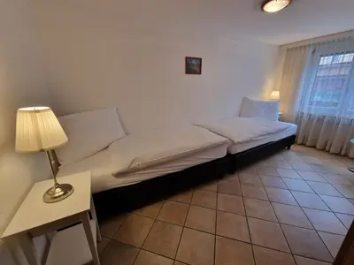 Ein Bett oder Betten in einem Zimmer der Unterkunft Apartment Haus Attila