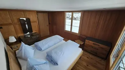 Ein Bett oder Betten in einem Zimmer der Unterkunft Chalet Bärgsunne