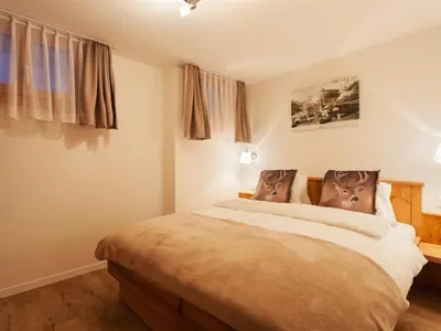 Ein Bett oder Betten in einem Zimmer der Unterkunft Apartment Apartment Bristolino by Interhome