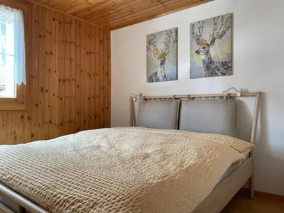 Ein Bett oder Betten in einem Zimmer der Unterkunft Apartment Konkordia 1 EG Süd by Interhome
