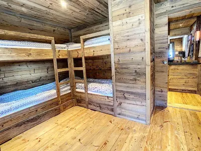 Ein Bett oder Betten in einem Zimmer der Unterkunft Crans-Montana Luxe & Charme Appartement - Ski in & Out