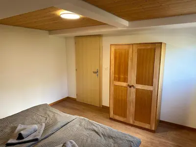 Ein Bett oder Betten in einem Zimmer der Unterkunft Chalet Luegistal