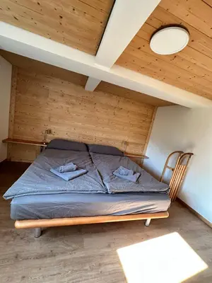 Ein Bett oder Betten in einem Zimmer der Unterkunft Chalet Luegistal