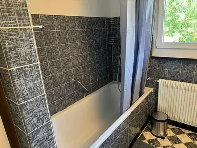 Ein Badezimmer in der Unterkunft See und Berge Loft