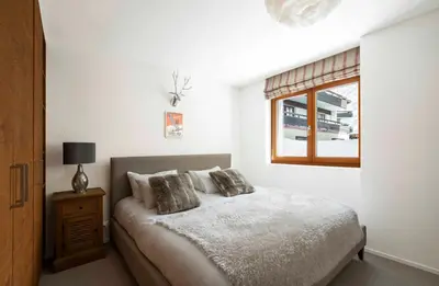 Ein Bett oder Betten in einem Zimmer der Unterkunft Sonnegg Lodge