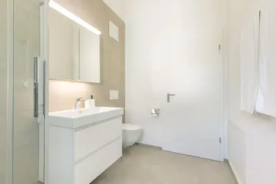 Ein Badezimmer in der Unterkunft Stockhorn Apartment - Aare Jungfrau AG