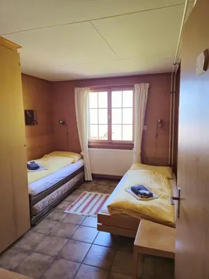 Ein Bett oder Betten in einem Zimmer der Unterkunft Berggasthaus Höchst
