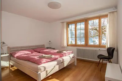 Ein Bett oder Betten in einem Zimmer der Unterkunft Chalet Gsür