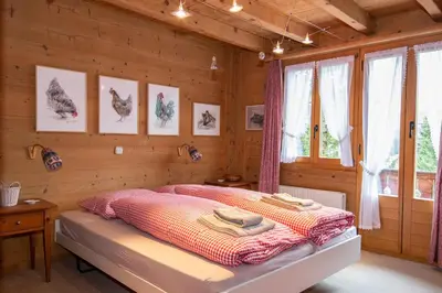 Ein Bett oder Betten in einem Zimmer der Unterkunft Chalet Meiseli
