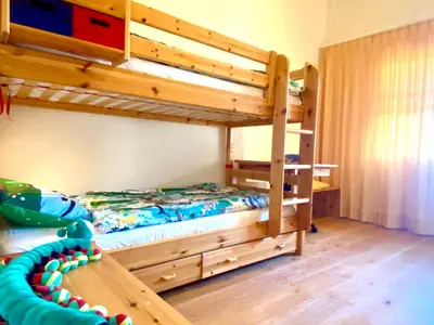 Ein Etagenbett oder Etagenbetten in einem Zimmer der Unterkunft Heidahüs Penthouse