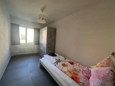 Ein Bett oder Betten in einem Zimmer der Unterkunft HANNA Apartment
