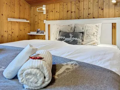 Ein Bett oder Betten in einem Zimmer der Unterkunft Appartement STERN - Confort au coeur de Saas-Fee
