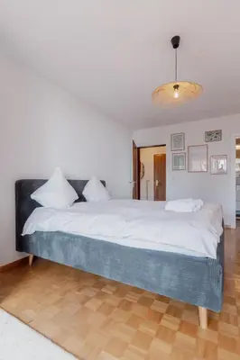 Ein Bett oder Betten in einem Zimmer der Unterkunft Cozy, calme, Ski-In et Ski-Out