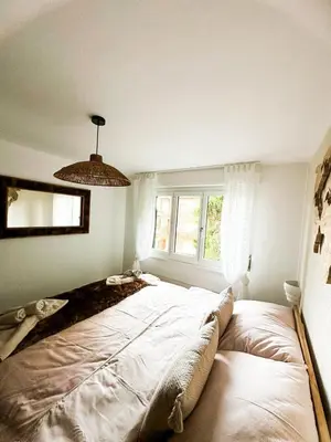 Ein Bett oder Betten in einem Zimmer der Unterkunft Charmant appartement avec vue splendide