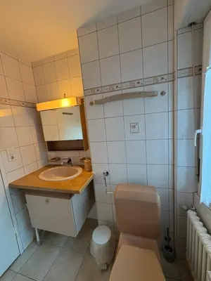 Ein Badezimmer in der Unterkunft Sonniges Apartment im Zentrum mit Bergblick