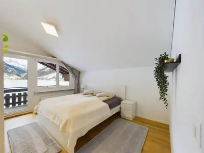 Ein Bett oder Betten in einem Zimmer der Unterkunft Majestic View Alpine Retreat