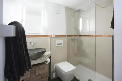 Ein Badezimmer in der Unterkunft Haus Andorra mit Matterhornblick