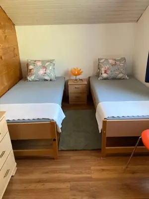 Ein Bett oder Betten in einem Zimmer der Unterkunft Haus Dorfblick