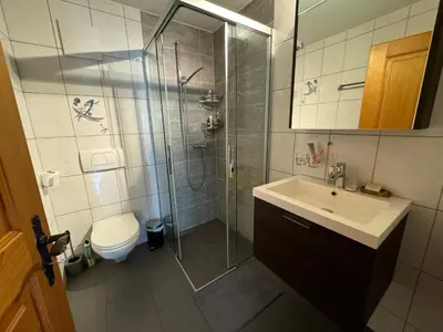 Ein Badezimmer in der Unterkunft Ferienwohnung Aspa EG Ost
