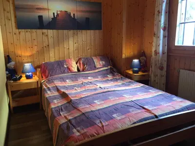 Ein Bett oder Betten in einem Zimmer der Unterkunft Chalet le Colinet