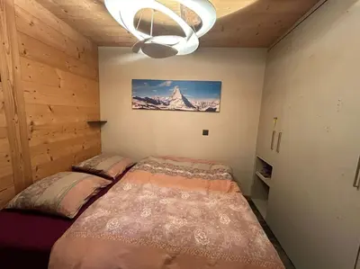 Ein Bett oder Betten in einem Zimmer der Unterkunft Cosy chalet - Renovated and charming