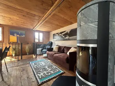 Ein Sitzbereich in der Unterkunft Cosy chalet - Renovated and charming